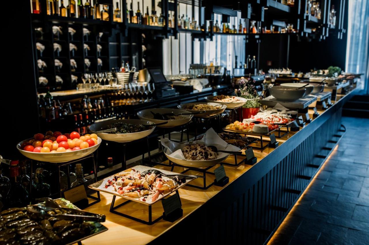 รูมเมอร์ส มิวนิค ออโตกราฟ คอลเลคชั่น Hotel มิวนิก ภายนอก รูปภาพ The bar at the restaurant