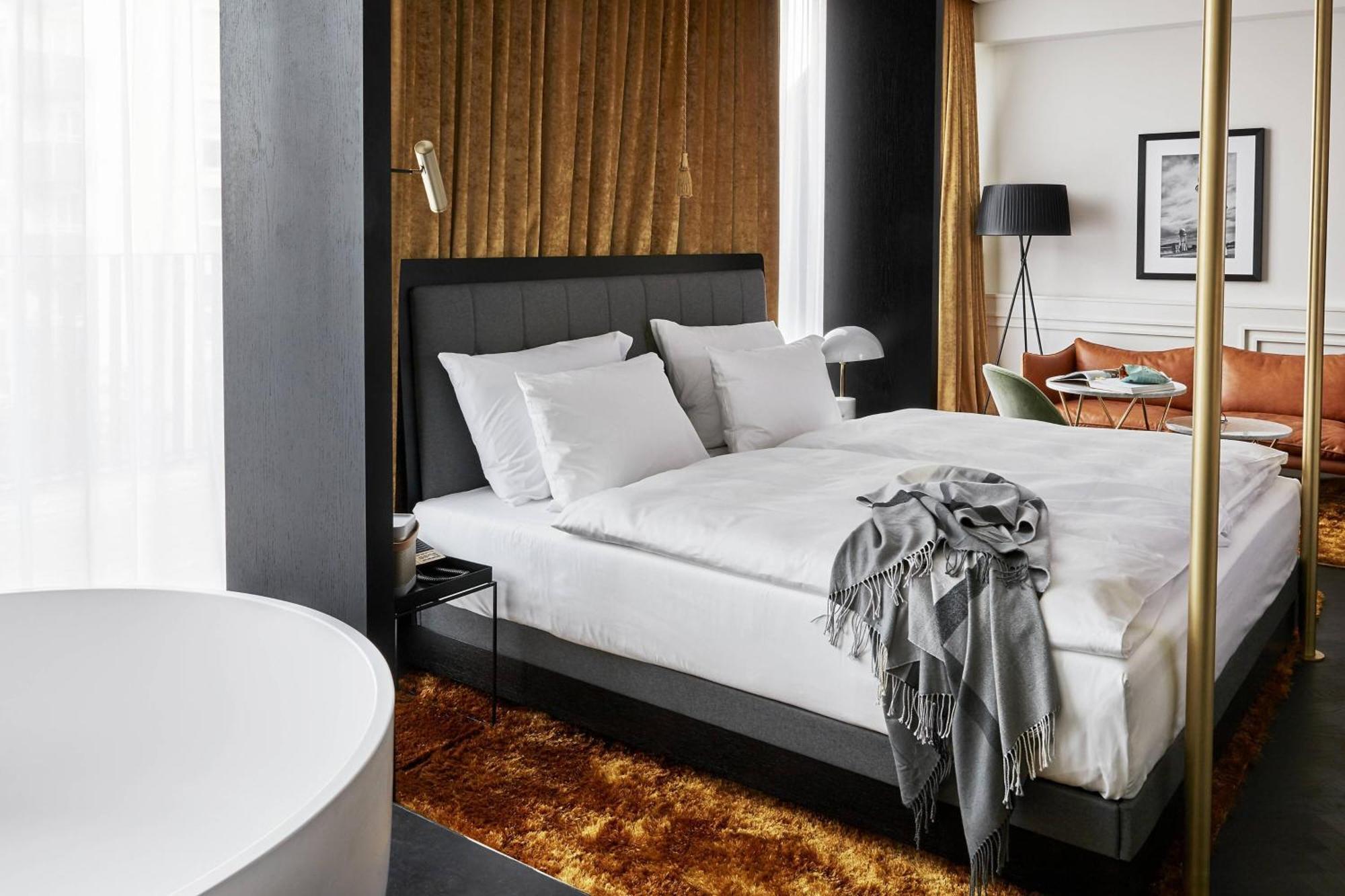 รูมเมอร์ส มิวนิค ออโตกราฟ คอลเลคชั่น Hotel มิวนิก ภายนอก รูปภาพ A bedroom at the Hotel