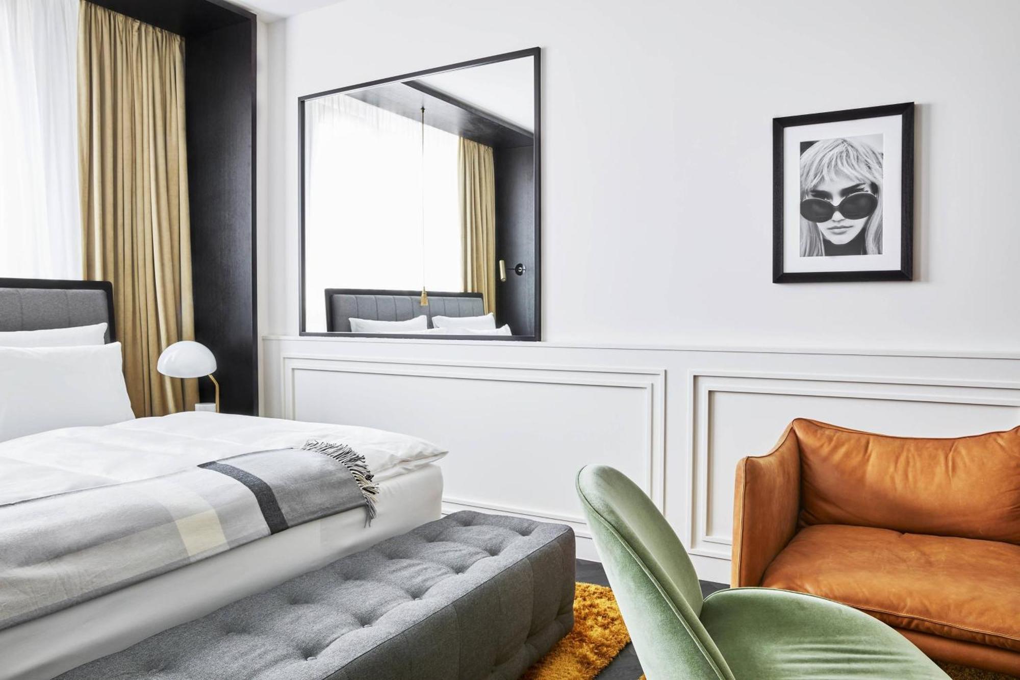 รูมเมอร์ส มิวนิค ออโตกราฟ คอลเลคชั่น Hotel มิวนิก ภายนอก รูปภาพ A bedroom at the hotel