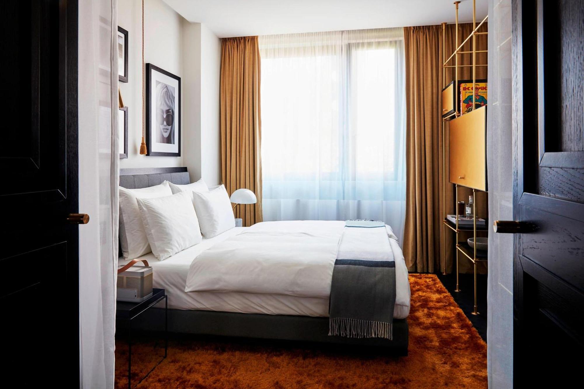 รูมเมอร์ส มิวนิค ออโตกราฟ คอลเลคชั่น Hotel มิวนิก ภายนอก รูปภาพ A room at the Hotel 57